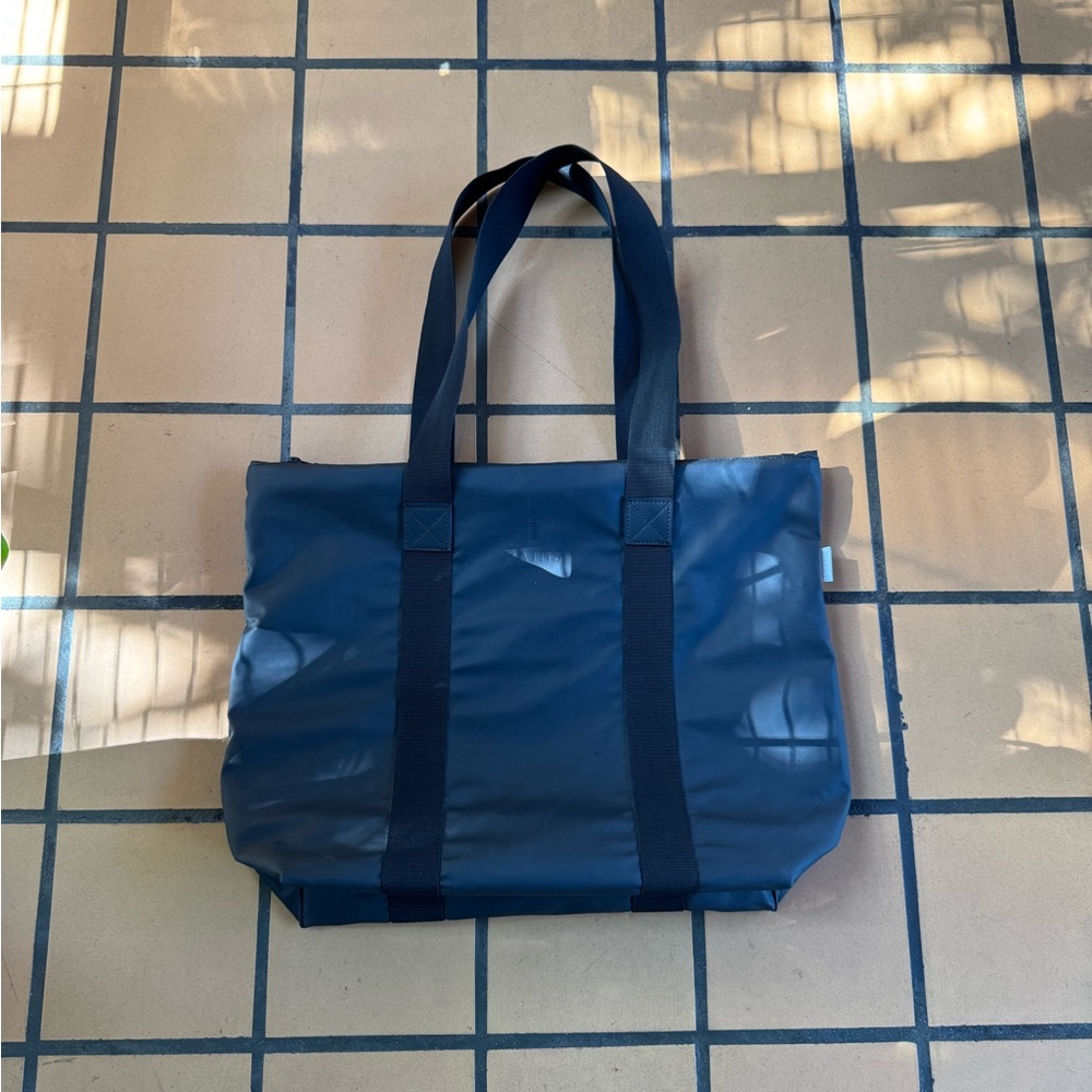 Rains Tote Bag